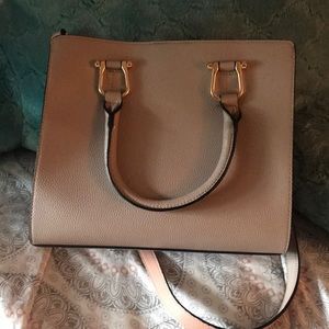 Large mauve purse with large middle pocket